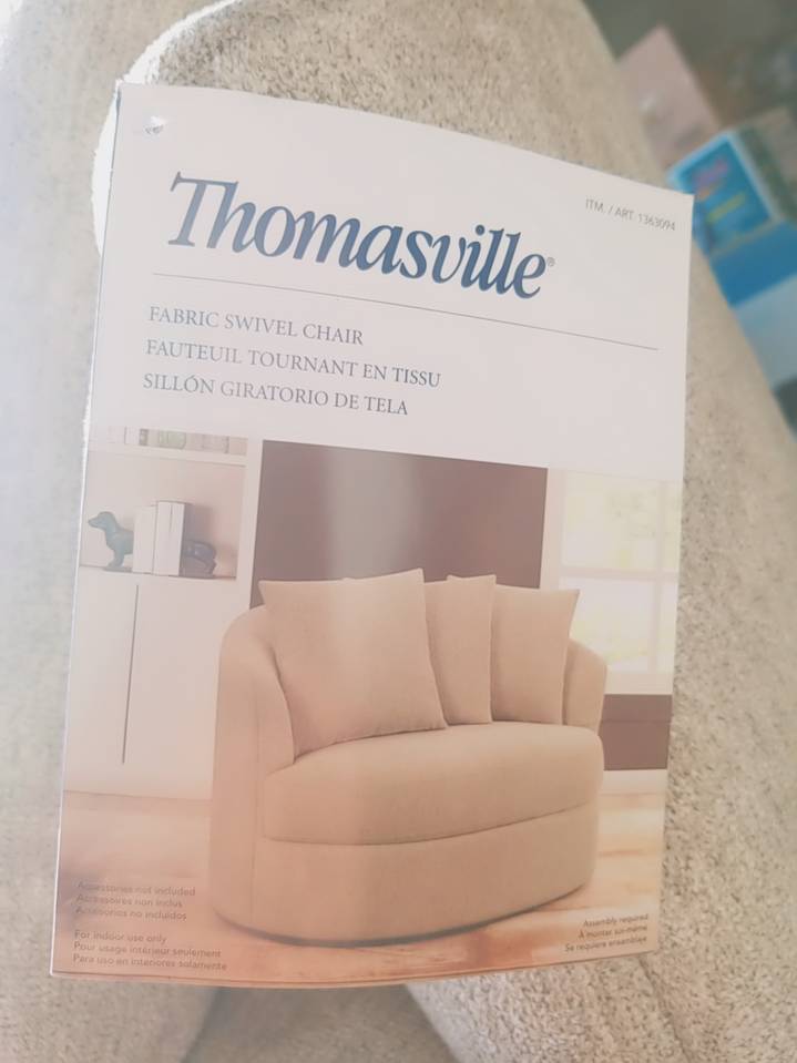 Thomasville fabric store snuggle swivel chair